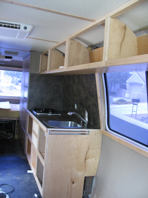 Upper cabinets and kitchen installed
