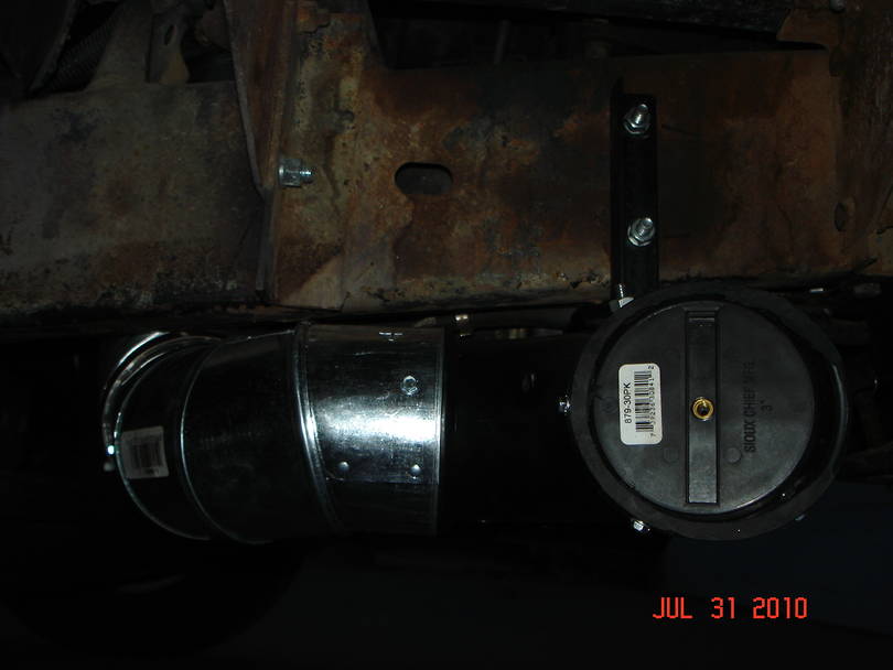 Installed next to radiator and angle up to top of motor