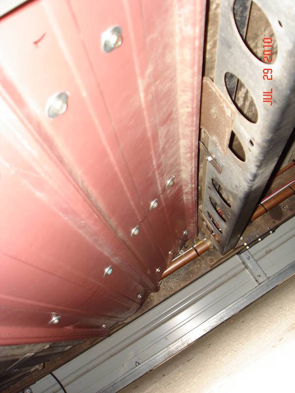 brkets bolted to frt member and alum siding