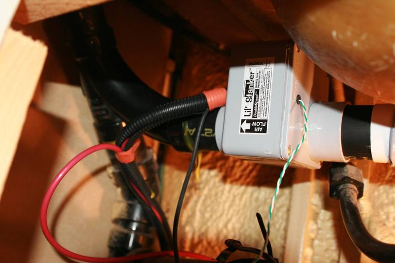 The inline fan connects the toilet to the vent stack.