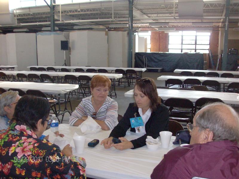Teri visiting with Frank Jenkins' bride and a couple more.