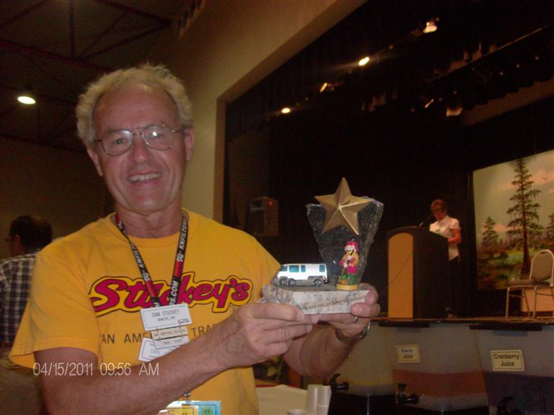 Dan Stuckey With A Trophy For Acting