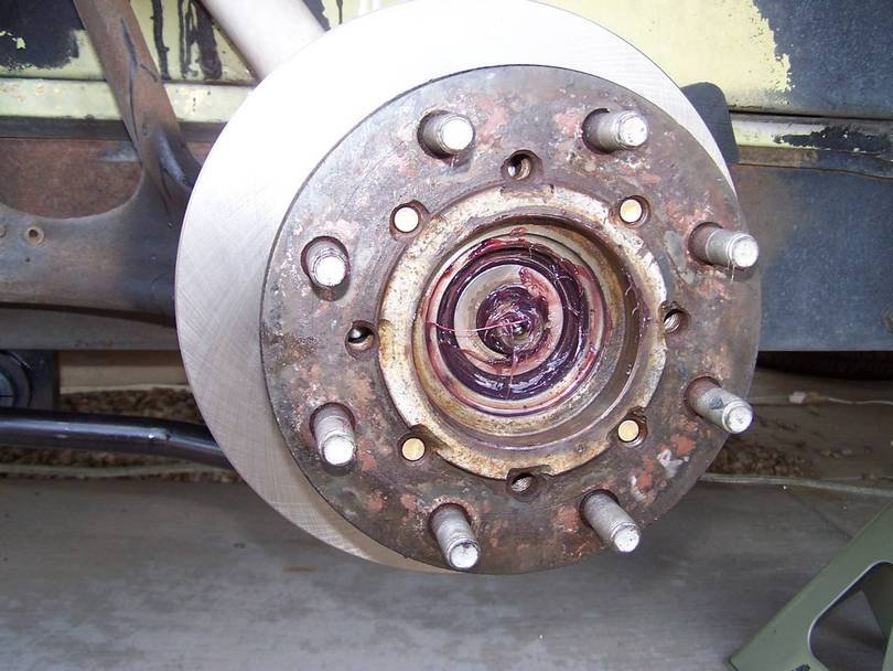 Outer bearing packed and installed on spindle