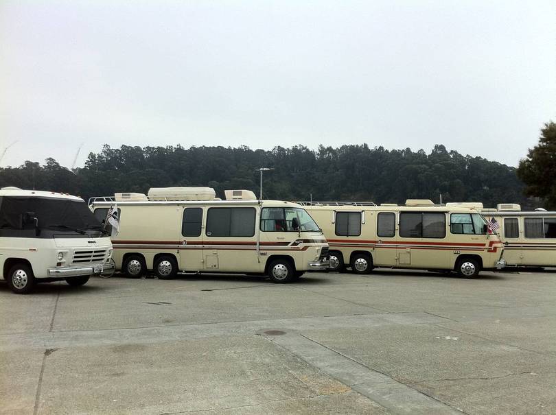 Coaches with Yerba Buena Island in the background
