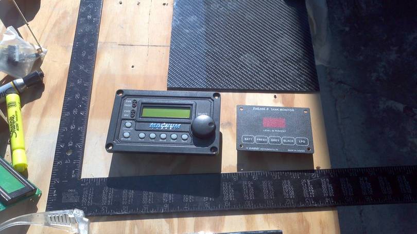 Inverter/charger control and tank monitor unit