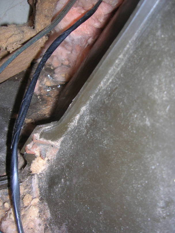 Looking from glove compartment, back of lower attach screw