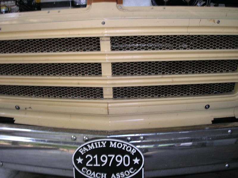 The decrepit grille is now secured with SS screws
