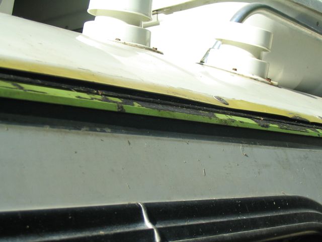 Driver side drip rail removed