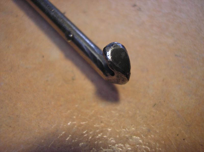 Sharpened End Facilitates Insertion Beneath Boot