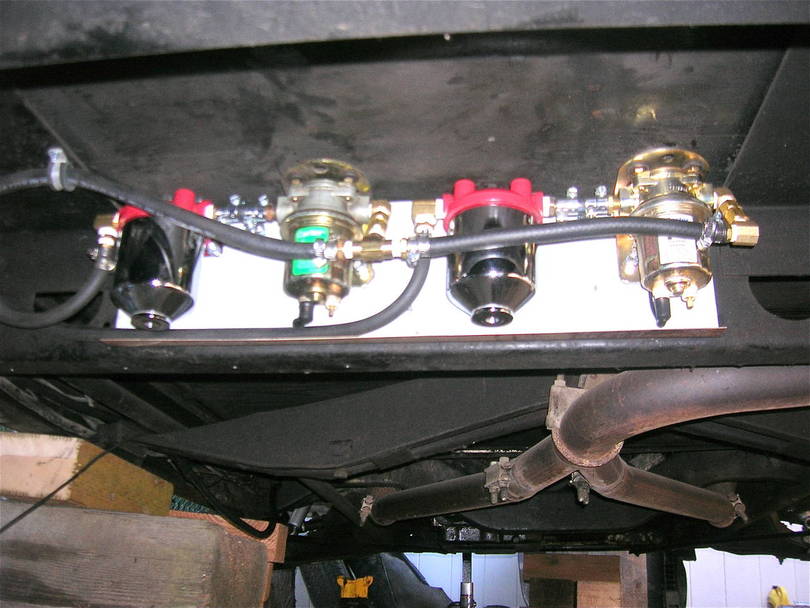 each tank feeds a filter and pump, select solenoid valve is eliminated