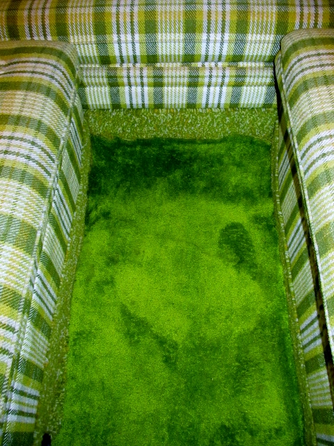green wool carpet covering original shag (except in cab)