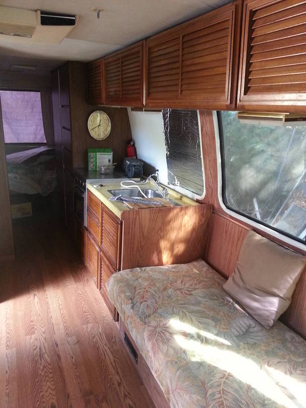 cabinets moved wall stained sofa in