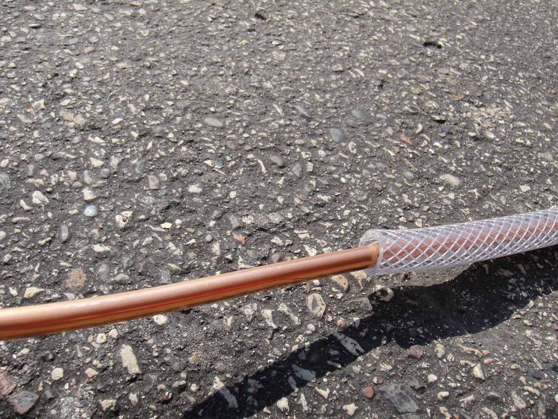 Copper line inside braided hose