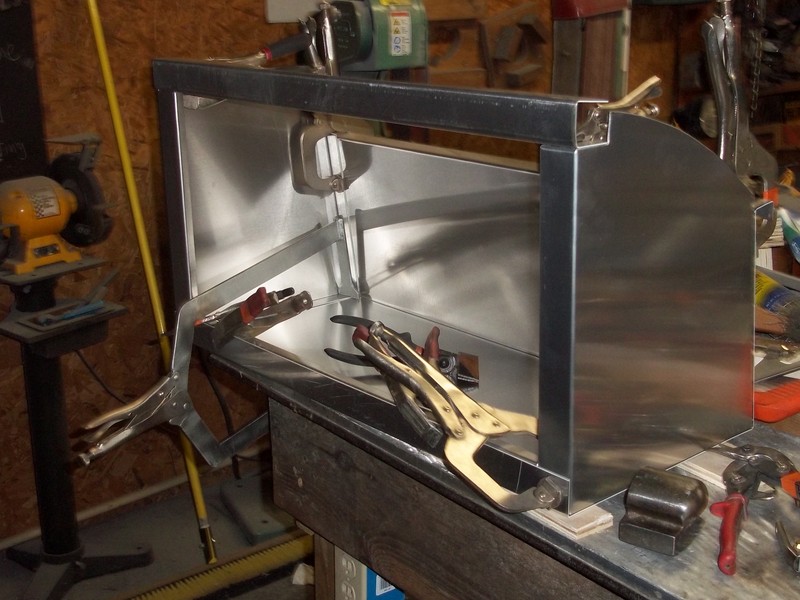 Aluminum cabinets being built.