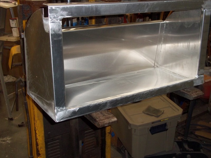 Aluminum cabinets being built.