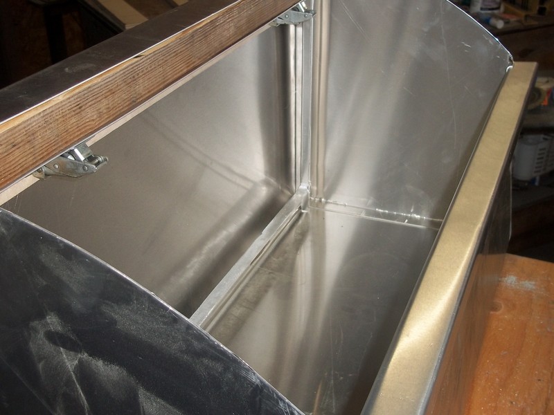 Aluminum cabinets being built.