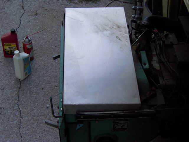 This is an old aluminum rack shelf-  right end view