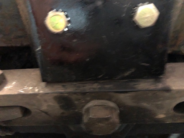 Reaction arm bolt anchor