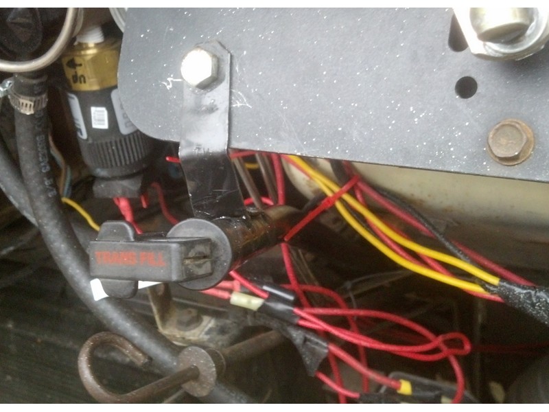 The old 'bottom' bolts to my electric windshield wiper bracket