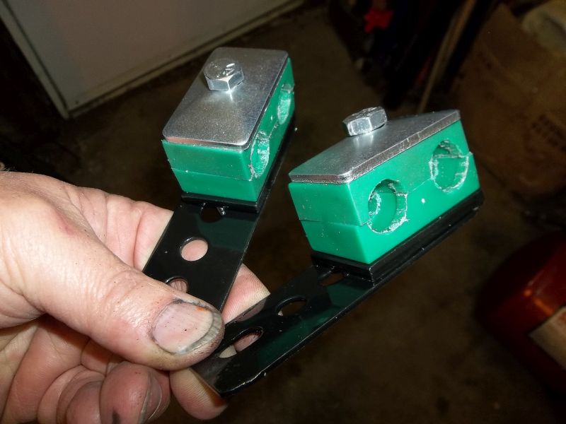 Brackets welded to Hose Clamps