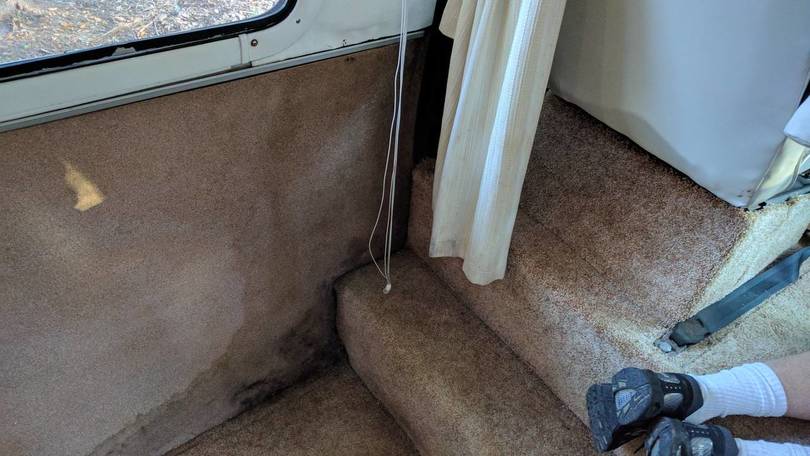 water leak behind drivers seat