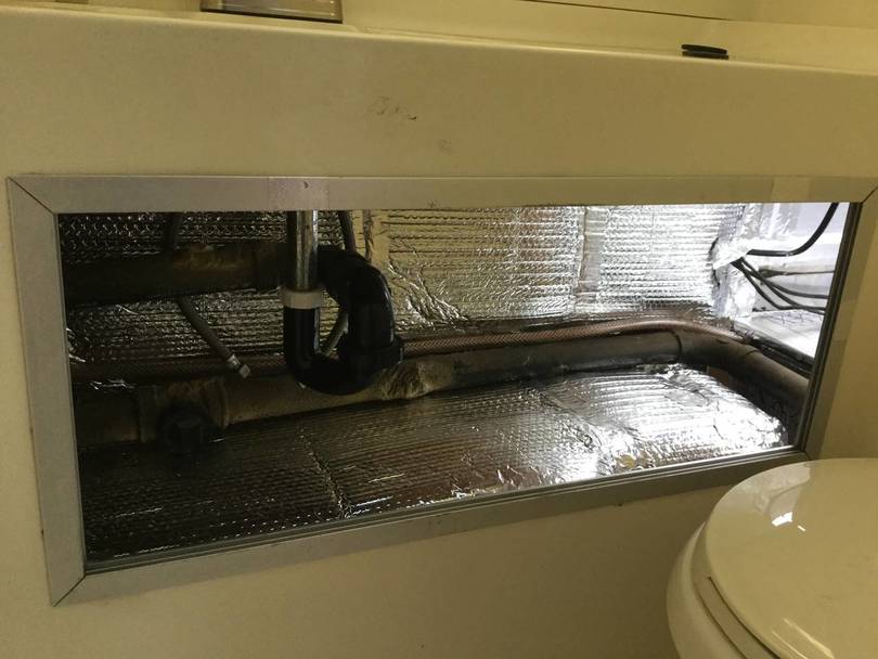 New storage area under bathroom counter