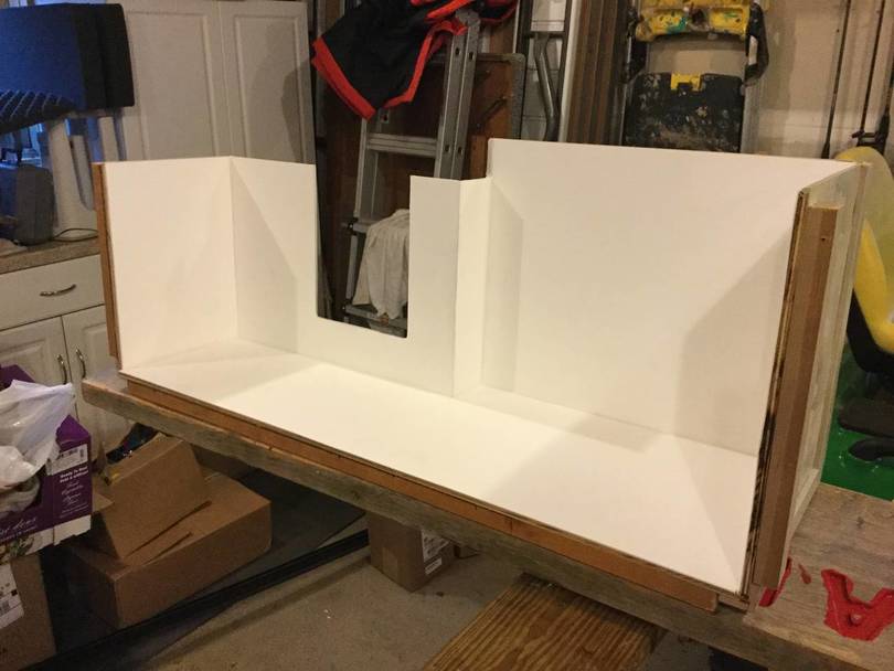 New storage area under bathroom counter