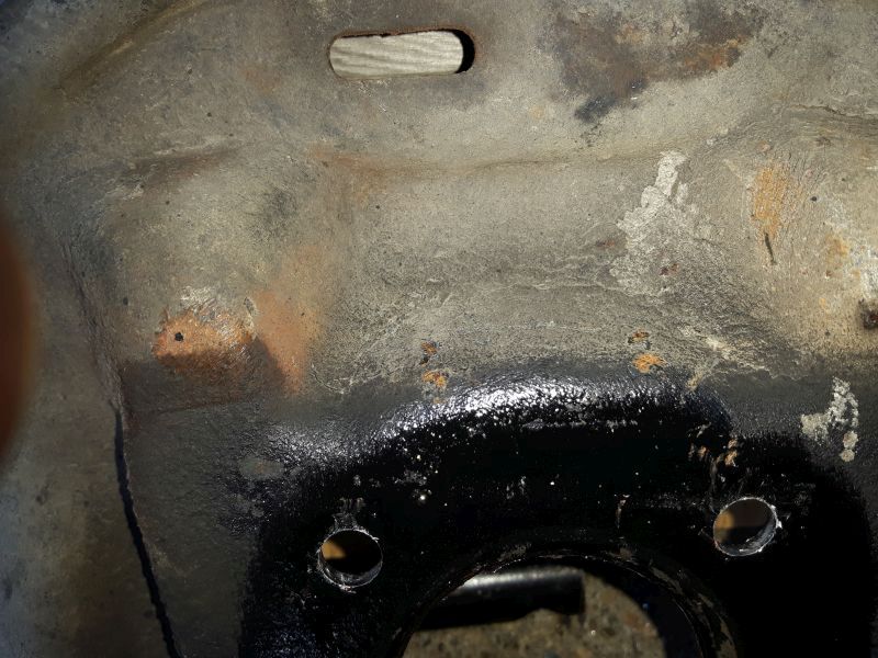 Marked area where bolts interfere with the plate