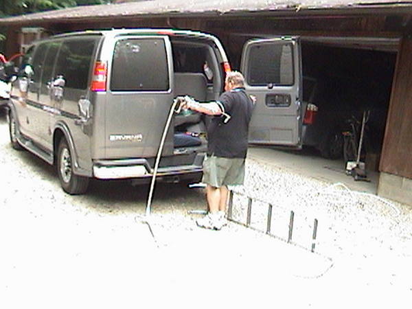 Don Hart loading up roof rack/steps